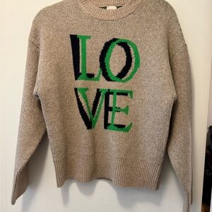 A New Day Oatmeal Sweater with Green and Black LOVE Design